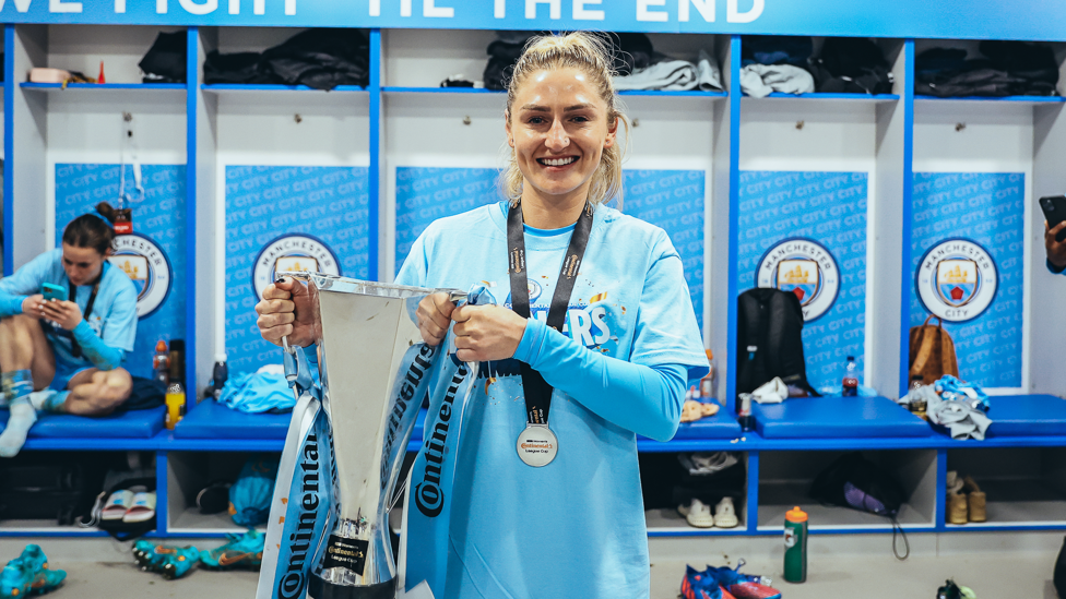 CUP QUEEN :  The midfielder lifts her second major trophy at the Club by helping us lift the 2021/22 Continental Cup