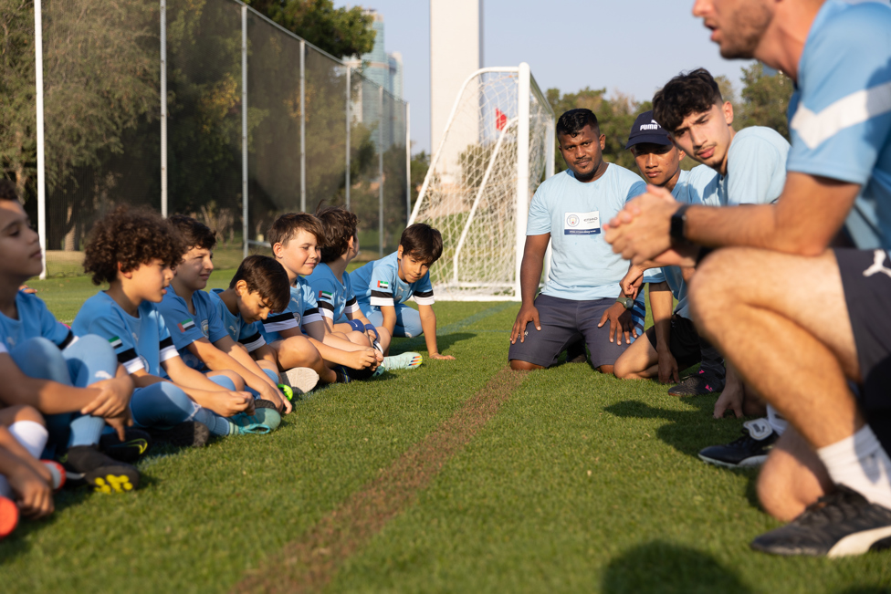 LEARNING : Young Leaders observe coaches at City Football Schools, Abu Dhabi