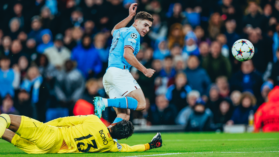 AGILE ALVAREZ : Julian rounds the goalkeeper and expertly fires into the roof of the net.