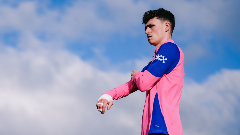 IN PINK: Phil Foden taking a break