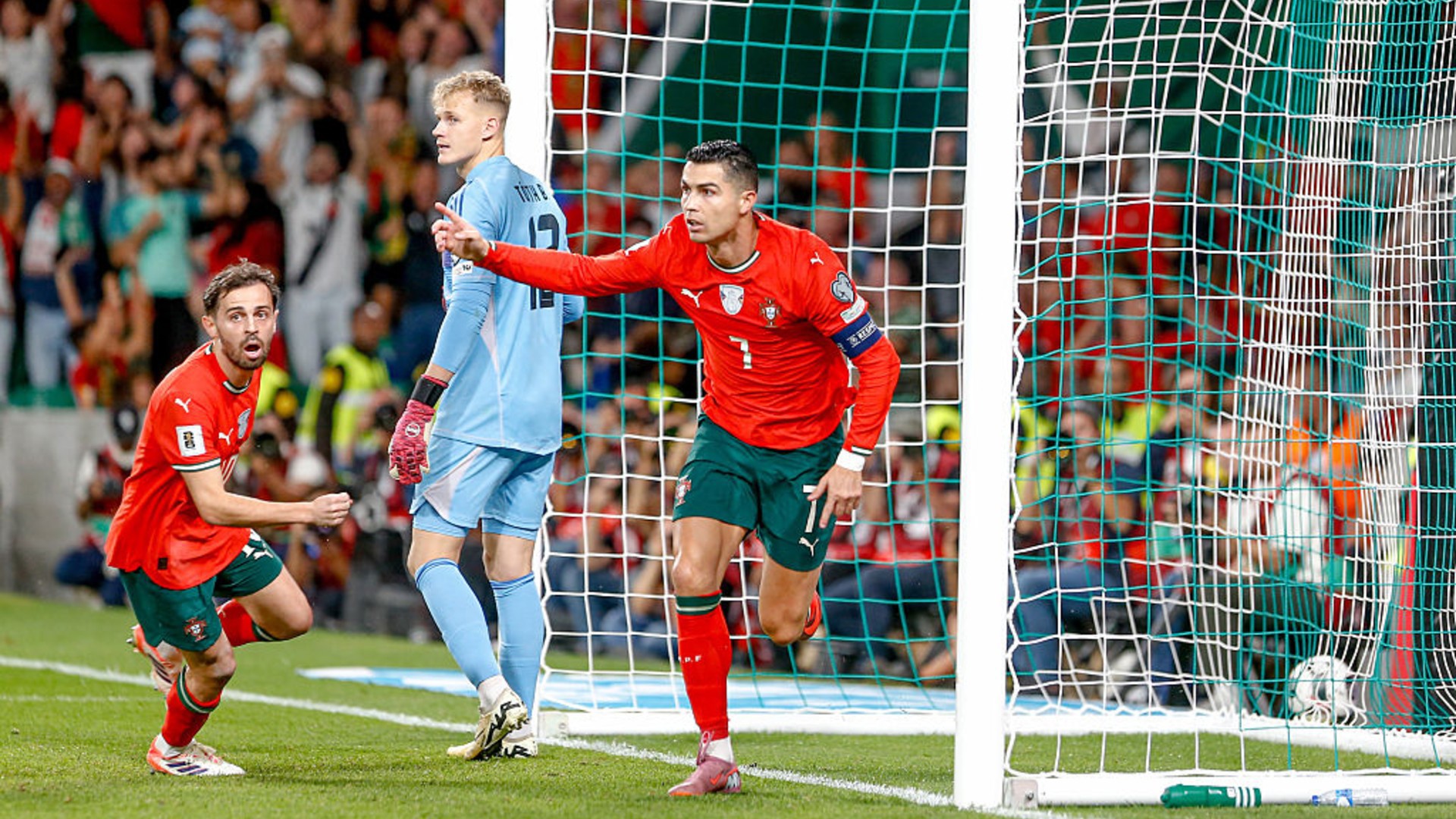 CELEBRATION TIME: Bernardo Silva and Cristiano Ronaldo react after Portugal's opener.