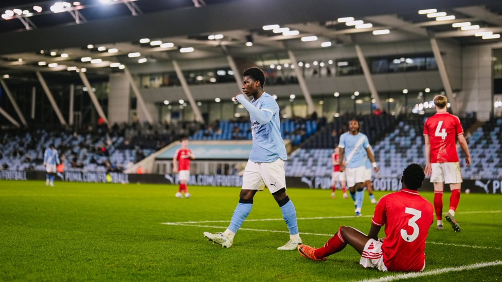 IN CONTROL : Ryan McAidoo celebrates his goal, City's second. 
