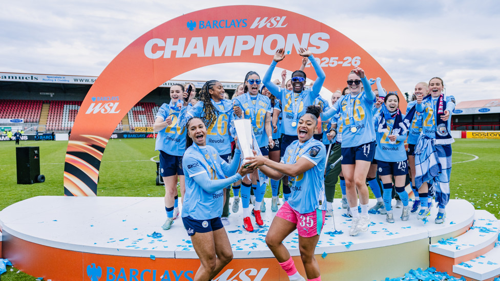 CELEBRATION : Keating lifts the 2025/26 WSL title following our final-day trip to West Ham.  