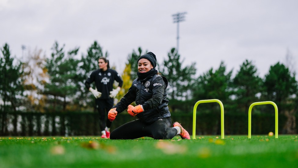 WARMING TO THE TASK: Khiara Keating limbers up during Tuesday's session.