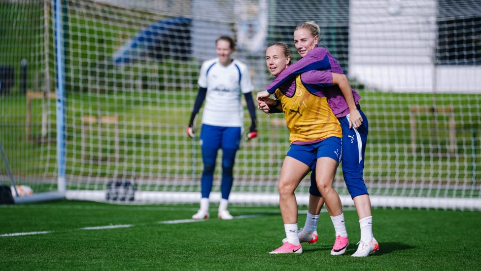 TRUE BLUES: Beth Mead and Alex Greenwood get to grips with things.