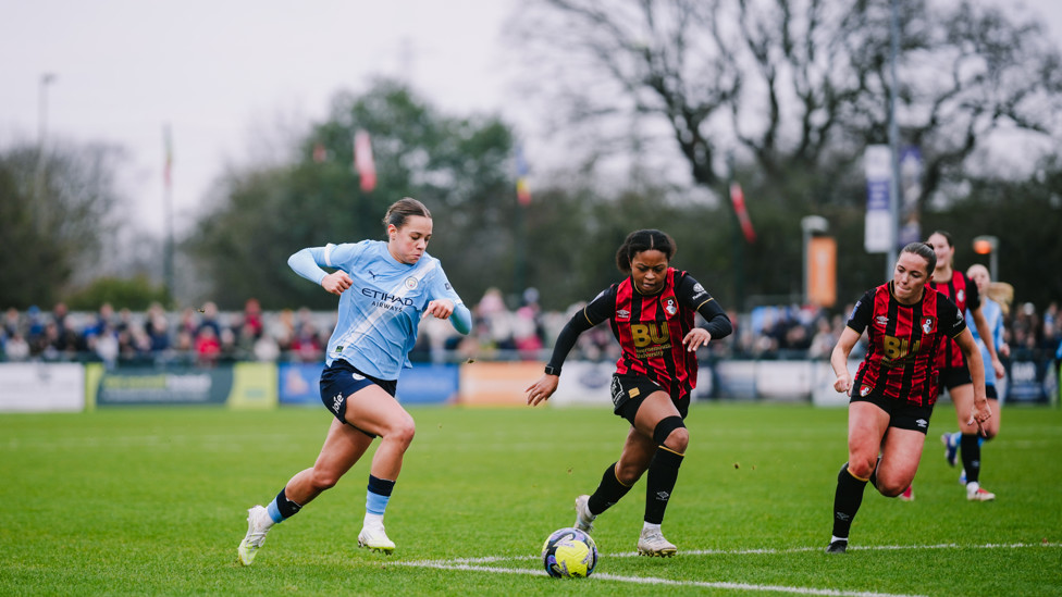 PUSHING  : Iman Beney looks to take on her opposite number.