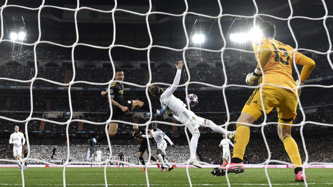 Gabriel Jesus scores against Real Madrid.