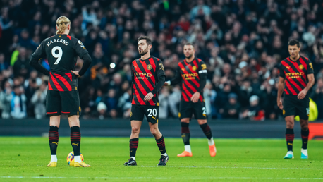 SETBACK: The players look dejected after Kane opens the scoring.