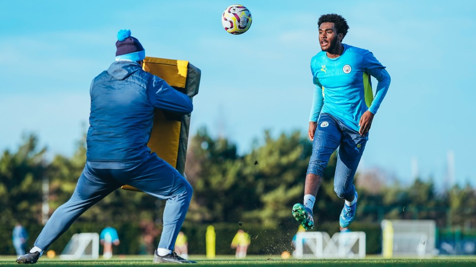 CHEEKY CHIP : Isaiah Dada-Mascoll dinks the ball over the coach. 
