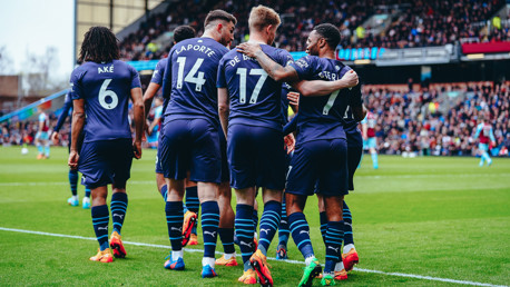 CENTRE OF ATTENTION: KDB feels the love from his teammates.