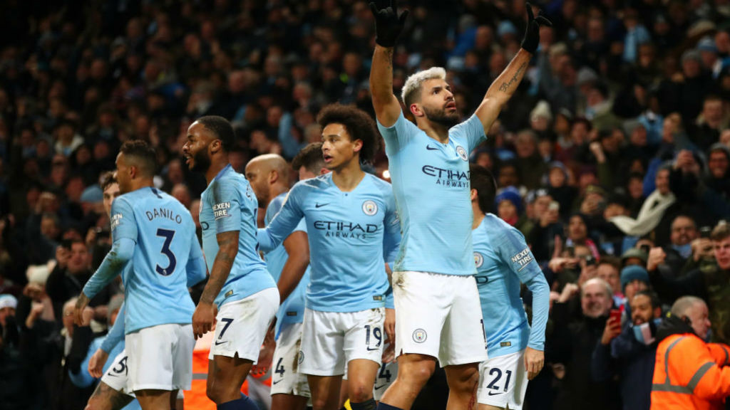 GLOVE STORY : Kun and his City team-mates celebrate his stunning strike against Liverpool
