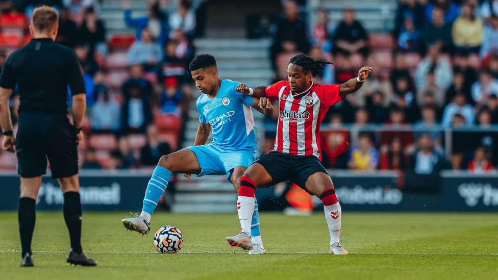 SHEA SHIELD : Shea Charles keeps hold of possession