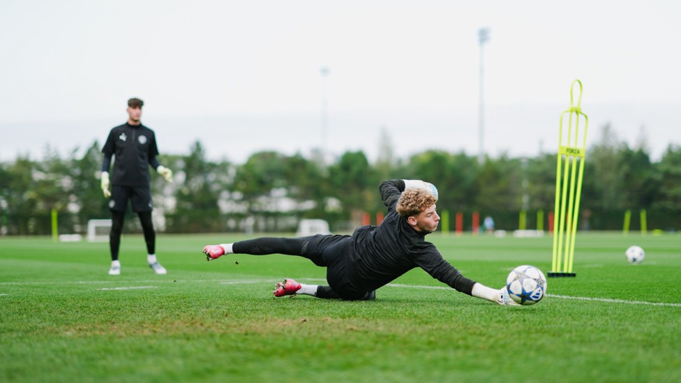 AT FULL STRETCH : Jack Wint makes a diving stop