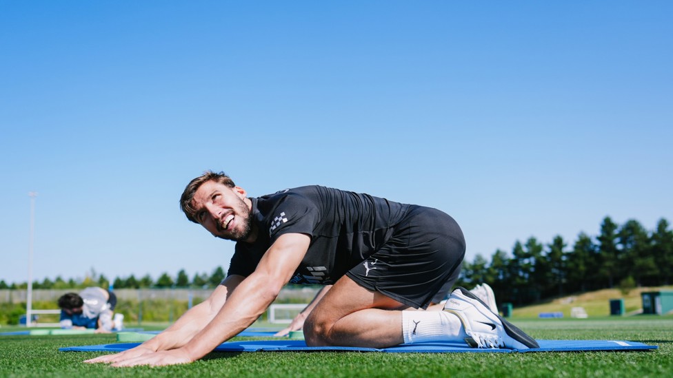 BIG STRETCH : Ruben Dias takes part in some yoga.