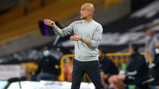 THE BOSS: Pep Guardiola gets his point across to the City players