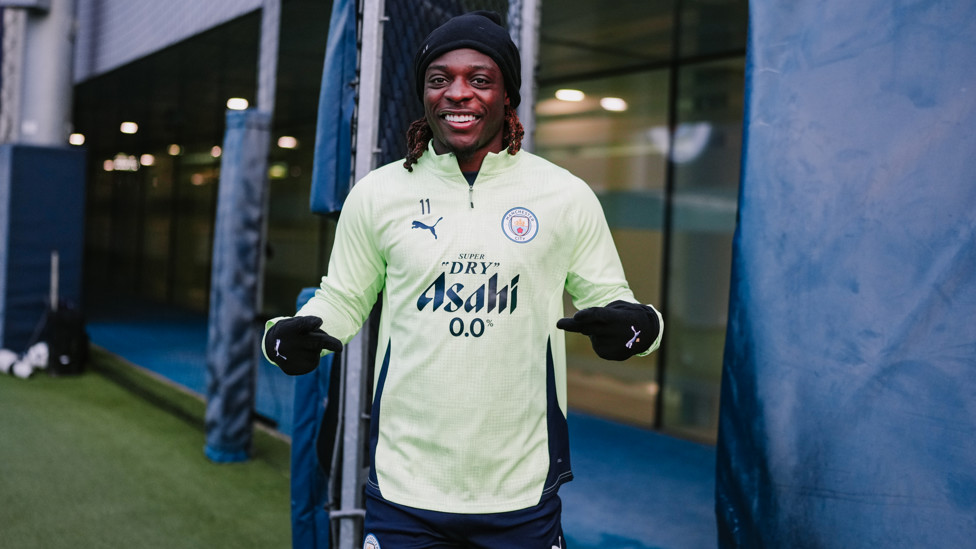 READY TO TRAIN : Jeremy Doku is all smiles ahead of Monday's session. 