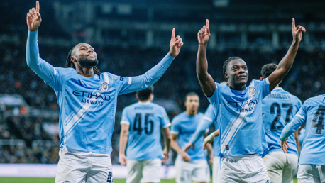 WING WIZARDS: Semenyo and Doku celebrate.