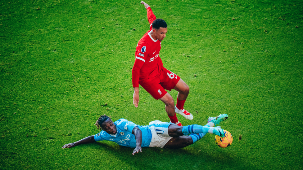 LAST DITCH DEFENDING: Manuel Akanji sliding in do deny Trent Alexander-Arnold