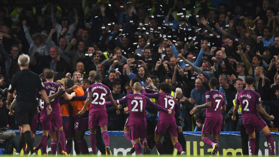 TICKER-TY BOO: The City players and fans celebrate KDB's stunning goal