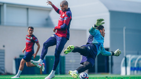 ACTION STATIONS: Fernandinho and Ederson are in the thick of things