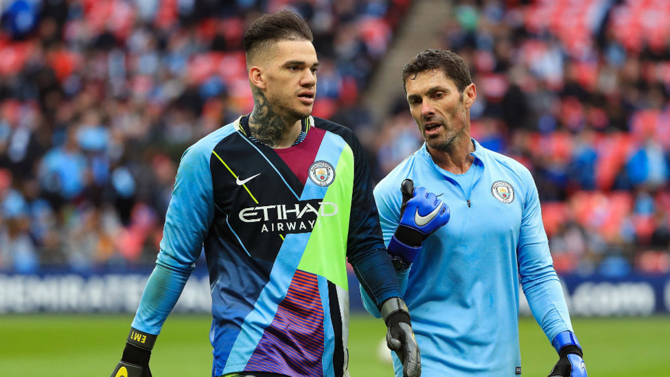 GRAB AND GO : Ederson got his hands on our mash up shirt.