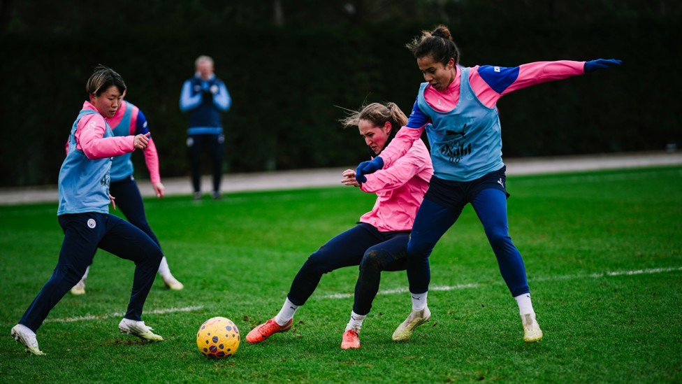 ON THE BALL : Sydney Lohmann in the heat of battle with Aoba Fujino and Mary Fowler