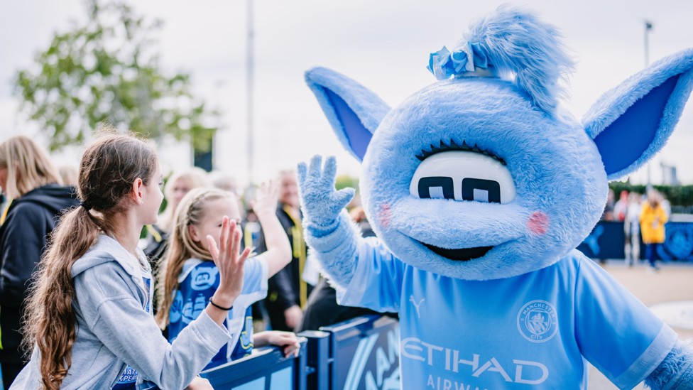 HIGH FIVE : Moonbeam on the blue carpet ahead of the team's arrival. 