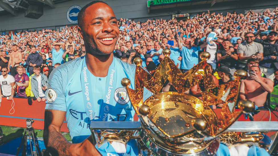 GOLDEN BOY : Parading the Premier League trophy in the remarkable Fourmidables season
