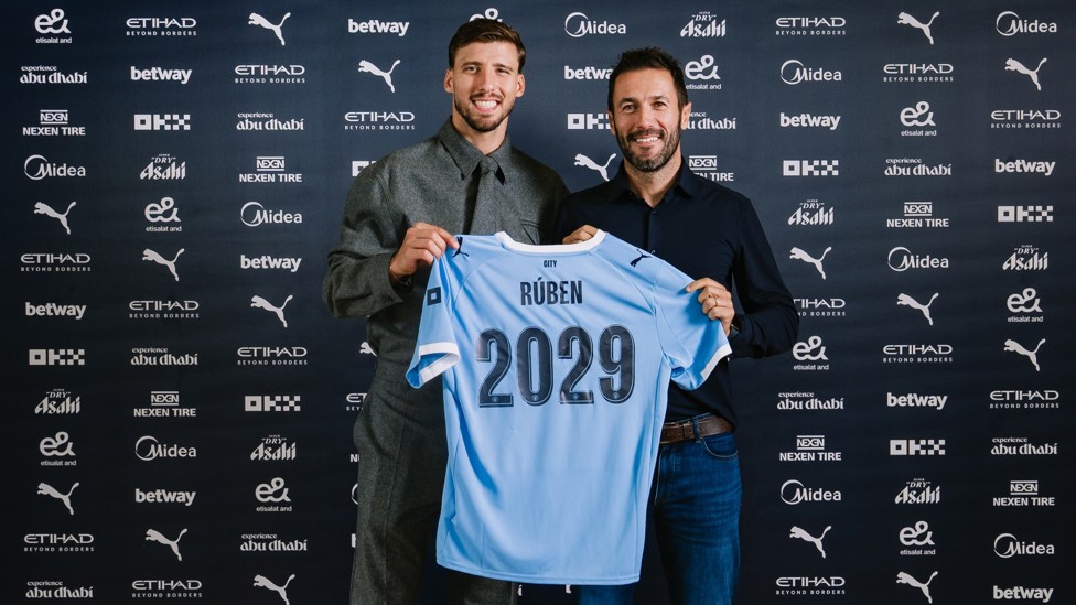 TOGETHER : Player and Director of Football arm in arm