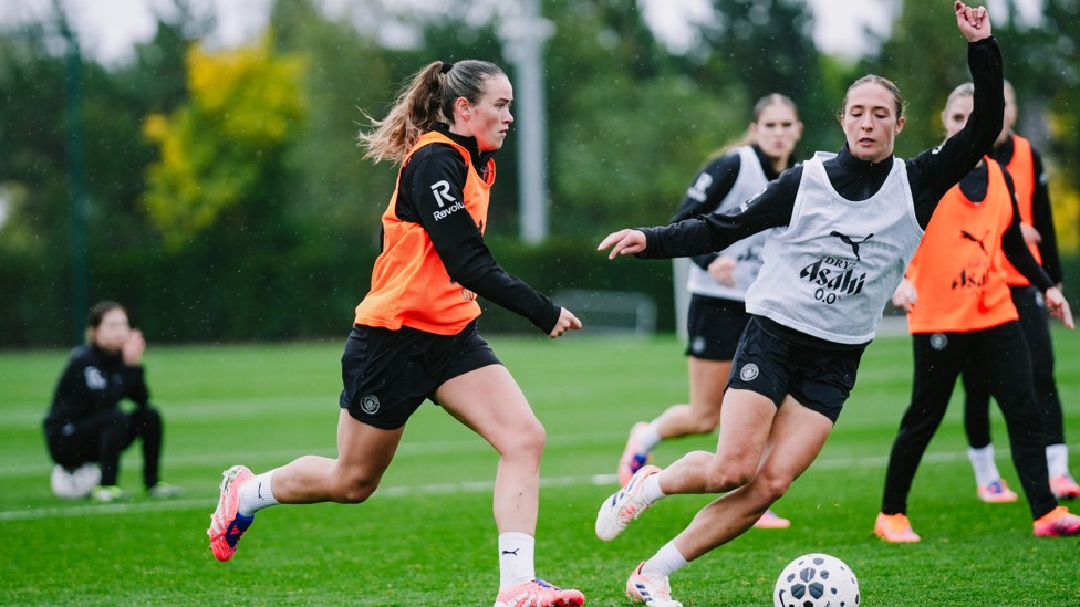 ON THE BALL  : Clinton maintains possession. 