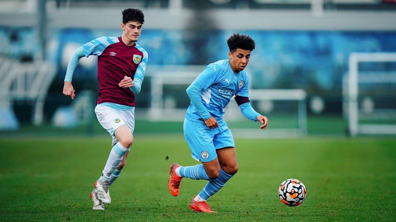 ACTION MAN: Skipper Rico Lewis takes the fight to Burnley