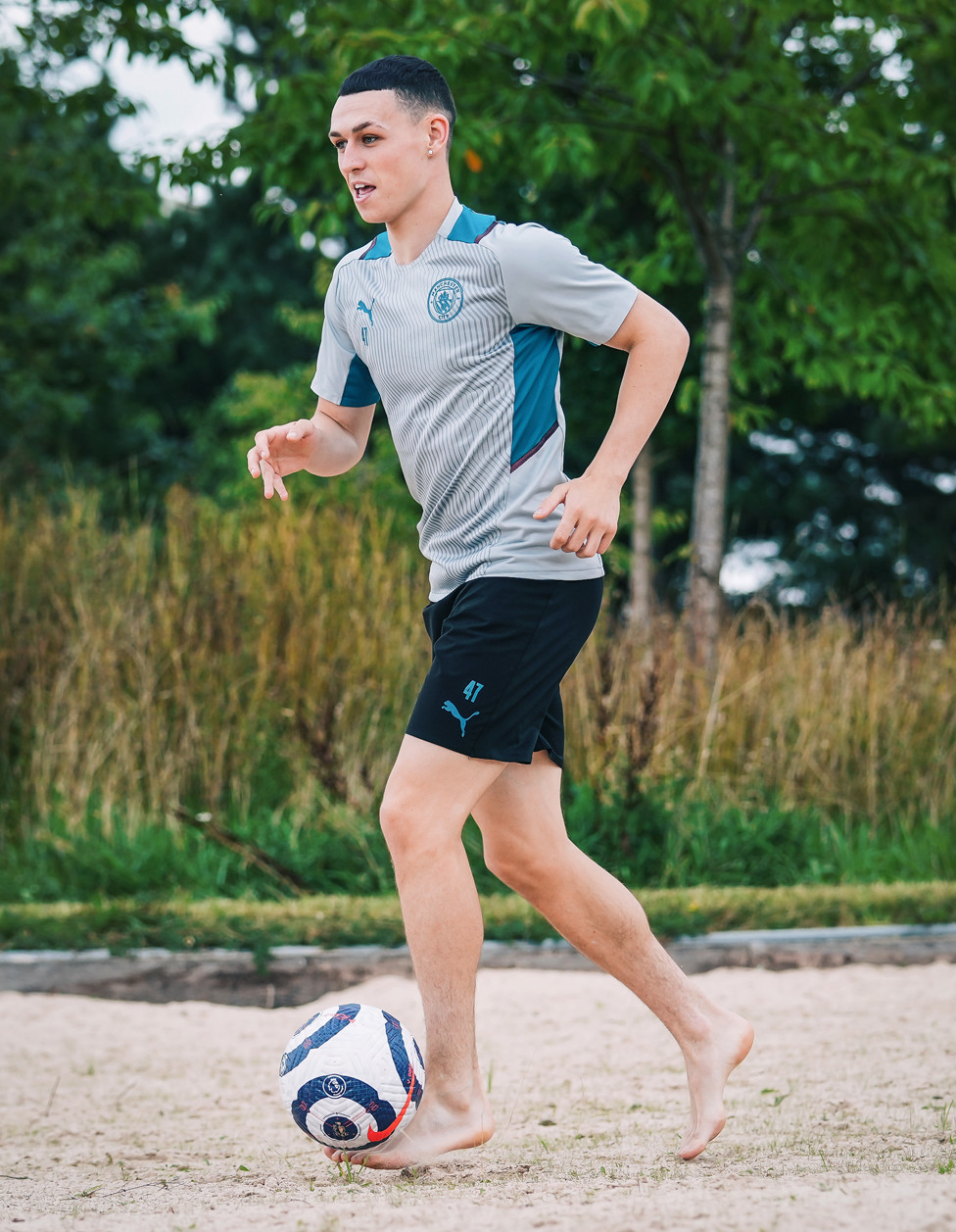 MOVING FORWARD : All smiles as ever with the ball at his feet!