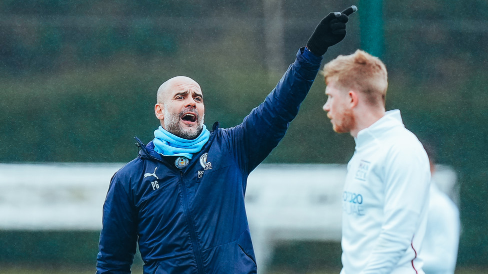 PEP TALK : Pep Guardiola dishes out some instructions