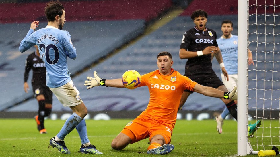 STRONG START: Bernardo's close-range effort is well saved by Emiliano Martinez