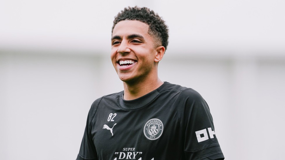 LAUGHING ALONG : Rico Lewis shares a joke with his team-mates