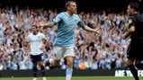 JOY: Craig Bellamy wheels away after scoring for City against Aston Villa.