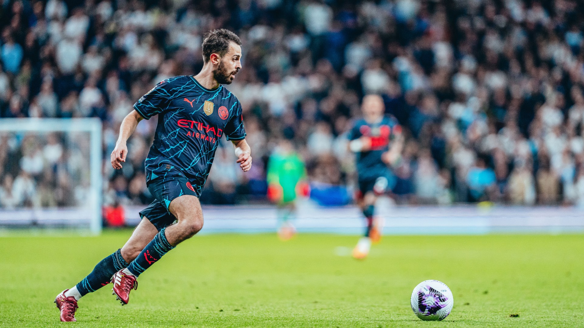 UP AND AT 'EM: Bernardo Silva powers on.
