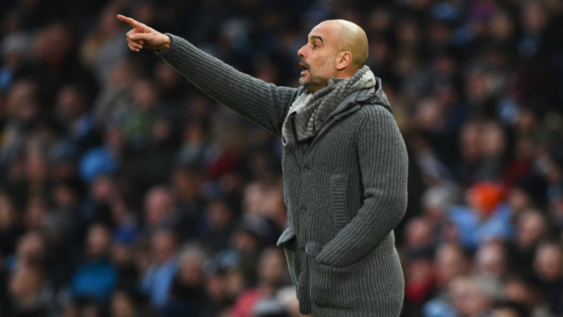 THE BOSS: Pep orchestrates his players from the touchline 