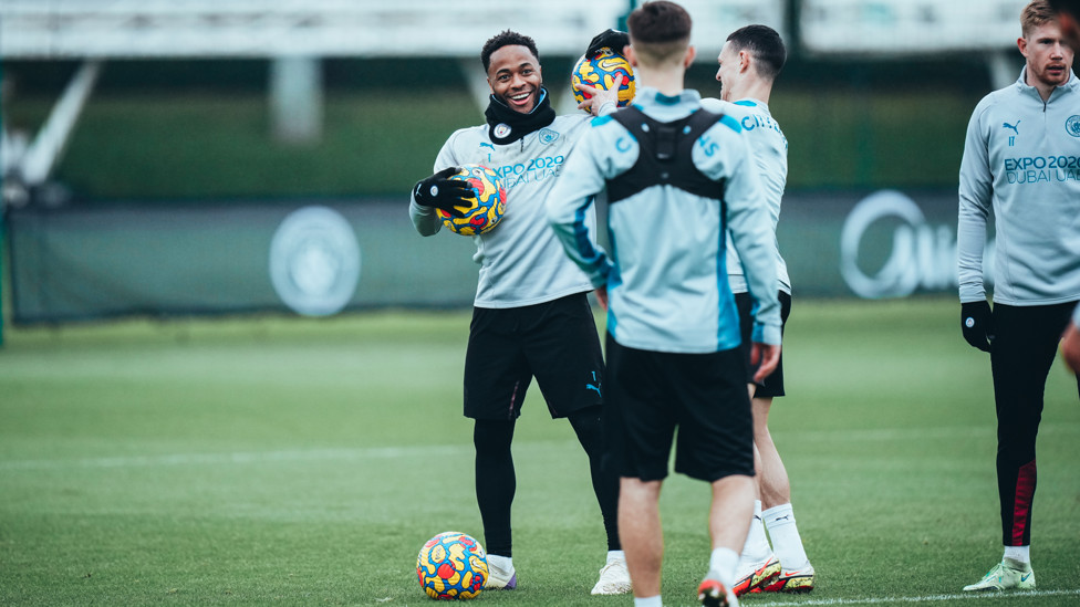 CAUSING A STER : Phil Foden wrestles the ball away from Raheem