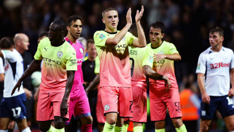 NIGHT TO REMEMBER: Taylor Harwood-Bellis and Eric Garcia (right) salute the City fans at Deepdale after our 3-0 Carabao Cup win over Preston