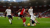 NO ENTRY: Dias slides in to block Walcott's cross.