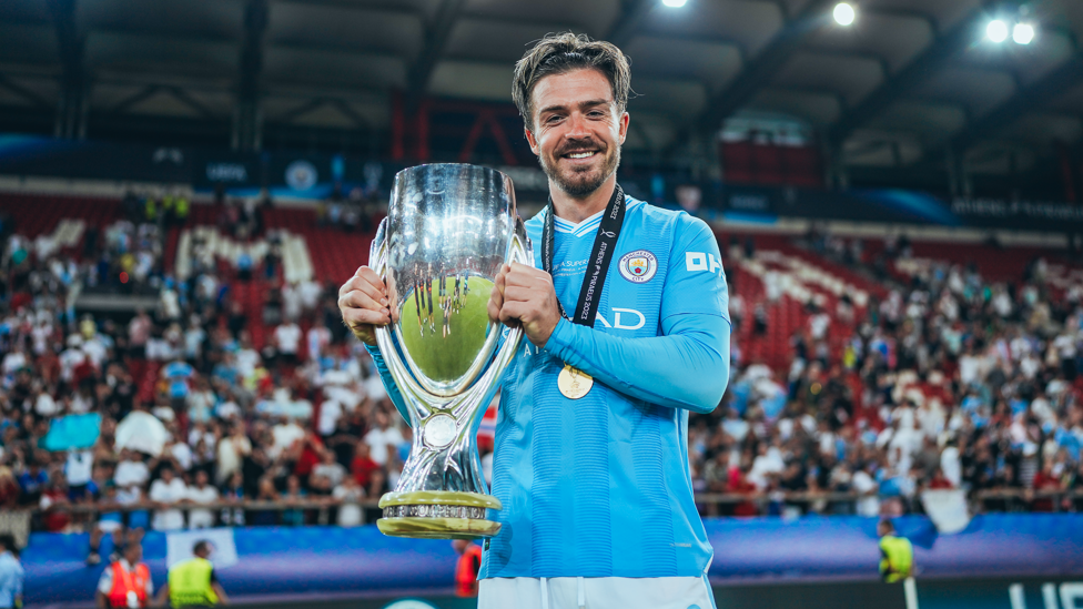 SUPER JACK : Holds the trophy.