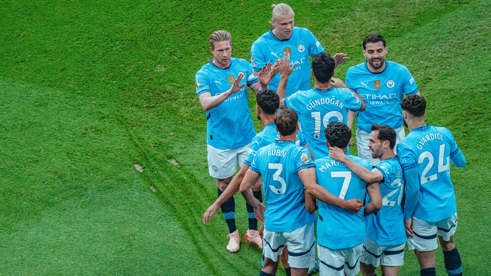 MAIN MAN MARMOUSH : Feels the love after his goal.
