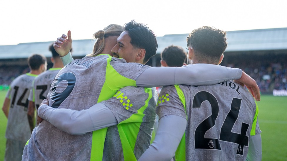 CELEBRATION TIME: Erling Haaland is mobbed after his first half header.