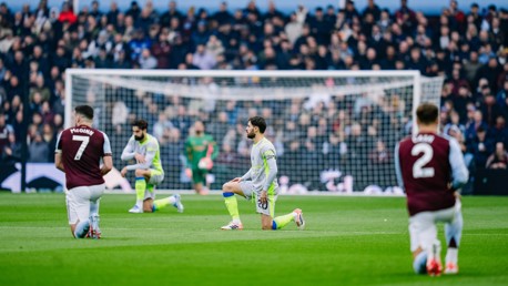 NO ROOM FOR RACISM: Taking a knee ahead of kick-off.