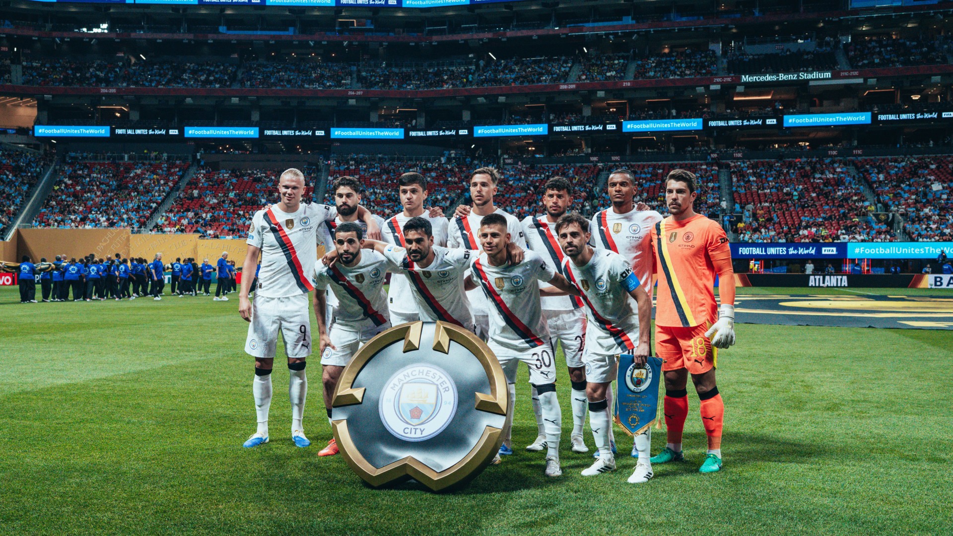ACTION MAN: The City squad line up ahead of kick-off.