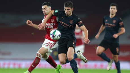 ROCKIN' RUBEN: Ruben Dias shields the play from Gabriel Martinelli