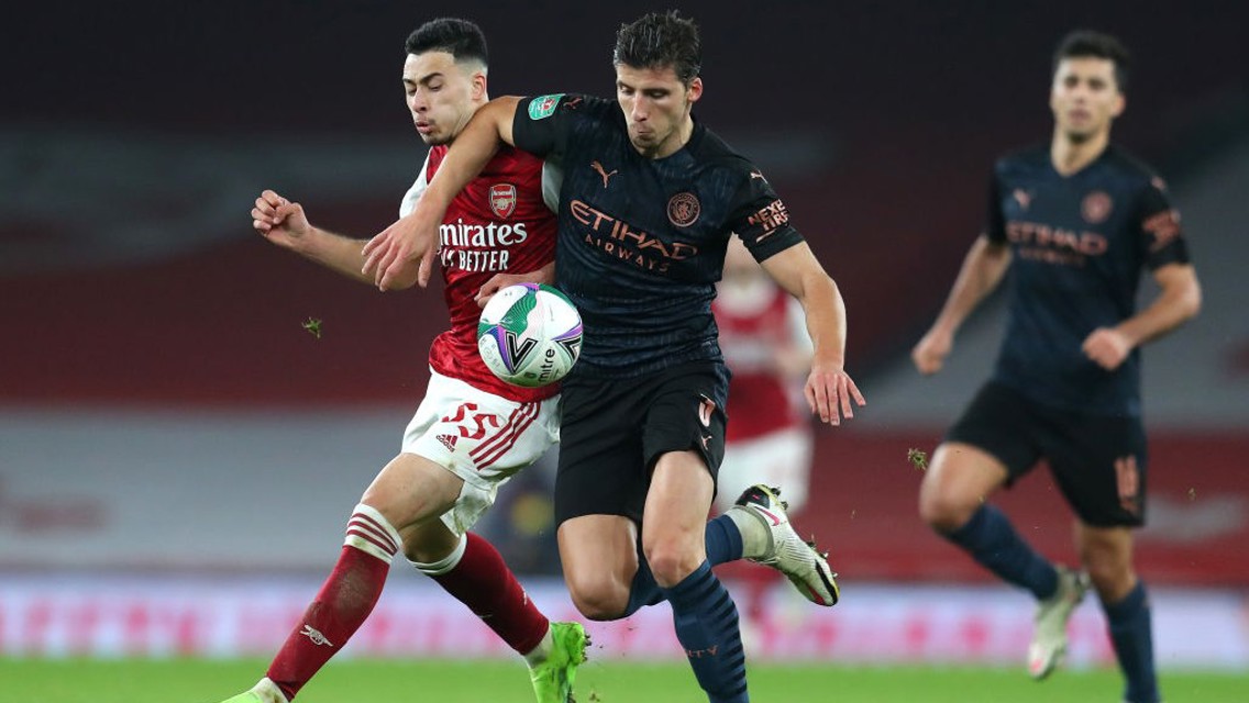 ROCKIN' RUBEN: Ruben Dias shields the play from Gabriel Martinelli