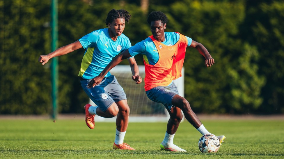 UNDER PRESSURE : Femi Fapetu evades Tyrone Samba. 