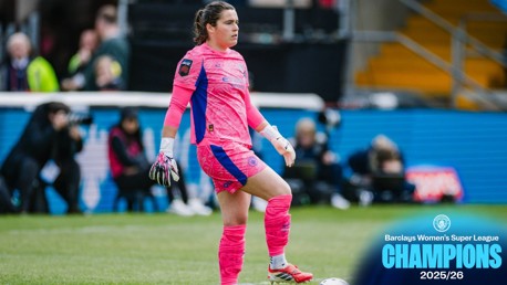 A football player in pink kit is on a field. Text reads 'Barclays Women's Super League Champions 2025/26'.
